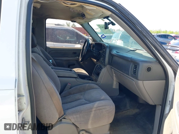 2005 Chevrolet Suburban LT z VIN 1GNEC16ZX5J100236, wystawiony jako IAAI lot #41920678 z przebiegiem 221 124 mil mil oraz . Historia ofert i sprzedaży dostępna na DreamBid. Obrazek 5.