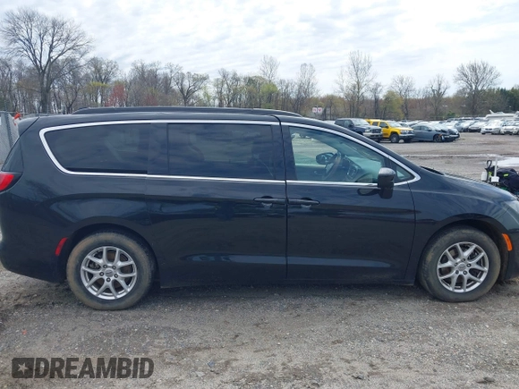 2021 Chrysler Voyager LXi with VIN 2C4RC1DG5MR532190, listed as a IAAI auction lot 42007631 with 101,280 mi miles and . Bid and sale history available at DreamBid. Image 13.
