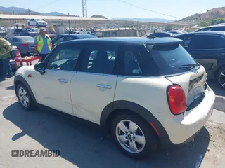 2016 MINI Hardtop 4 Door with VIN WMWXU1C56G2D10605, listed as a IAAI auction lot 42411431 with 35,367 mi miles and . Bid and sale history available at DreamBid. Image 3.