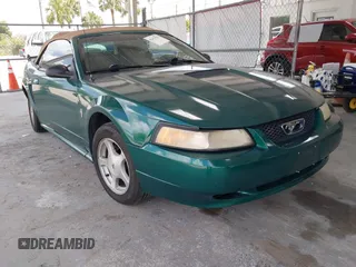 2001 Ford Mustang Deluxe z VIN 1FAFP44441F198354, wystawiony jako IAAI lot #42433701 z przebiegiem 69 328 mil mil oraz . Historia ofert i sprzedaży dostępna na DreamBid. Obrazek 1.