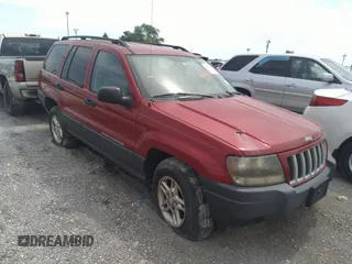 2004 Jeep Grand Cherokee Laredo with VIN 1J4GW48SX4C160475, listed as a IAAI auction lot 36500183 with 189,047 mi miles and . Bid and sale history available at DreamBid. Image 1.