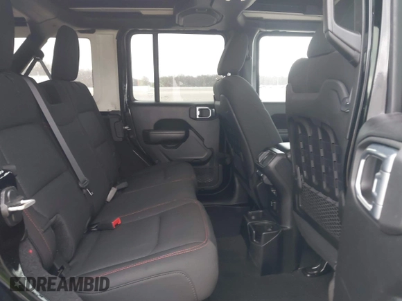 2021 Jeep Wrangler Unlimited Rubicon with VIN 1C4HJXFG8MW775419, listed as a IAAI auction lot 41797178 with 56,166 mi miles. Bid and sale history available at carsss.com. Image 8.