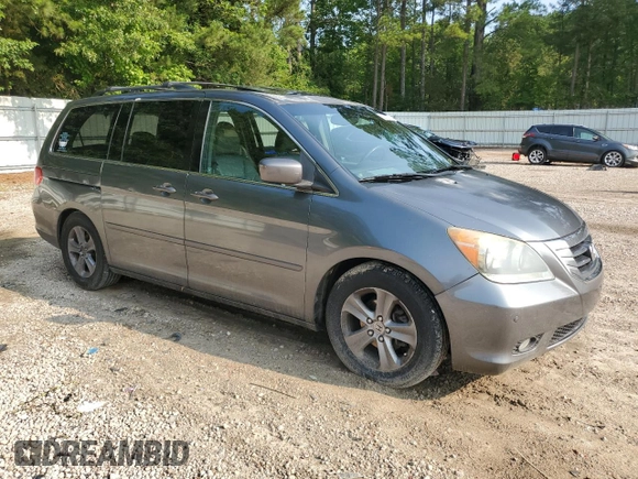 2010 Honda Odyssey Touring с VIN 5FNRL3H93AB087771, выставлен на аукционе Copart как лот 59322835 с пробегом 247 000 миль миль и Чистый • Clean title. История ставок и продаж доступна на DreamBid. Изображение 4.