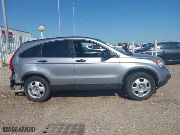 2008 Honda CR-V LX with VIN JHLRE38358C013848, listed as a IAAI auction lot 42008763 with 112,831 mi miles. Bid and sale history available at carsss.com. Image 13.