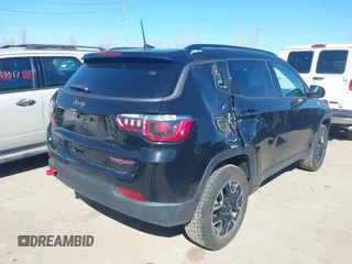 2019 Jeep Compass Trailhawk with VIN 3C4NJDDB1KT671642, listed as a IAAI auction lot 41810138 with 119,029 mi miles and . Bid and sale history available at carsss.com. Image 4.
