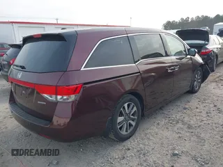 2015 Honda Odyssey Touring Elite with VIN 5FNRL5H9XFB026405, listed as a IAAI auction lot 41780562 with 134,897 mi miles and . Bid and sale history available at DreamBid. Image 4.