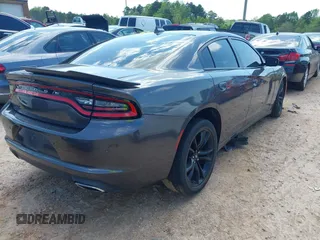 2018 Dodge Charger SXT Plus with VIN 2C3CDXHG6JH253191, listed as a IAAI auction lot 41988535 with 69,320 mi miles and . Bid and sale history available at carsss.com. Image 4.