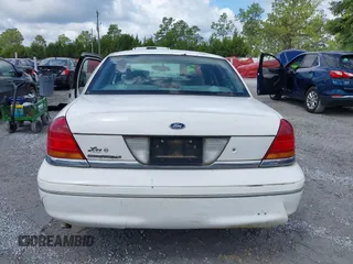 2001 Ford Crown Victoria LX z VIN 2FAFP74W81X102216, wystawiony jako IAAI lot #42388800 z przebiegiem 225 623 mil mil oraz . Historia ofert i sprzedaży dostępna na DreamBid. Obrazek 16.