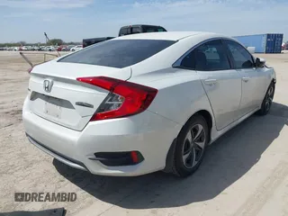2019 Honda Civic Sedan LX with VIN 19XFC2F64KE040214, listed as a IAAI auction lot 41753300 with 74,285 mi miles. Bid and sale history available at carsss.com. Image 4.