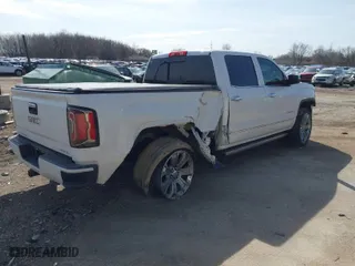 2017 GMC Sierra 1500 Denali with VIN 3GTU2PEJ5HG239623, listed as a IAAI auction lot 41783709 with 61,641 mi miles. Bid and sale history available at carsss.com. Image 4.