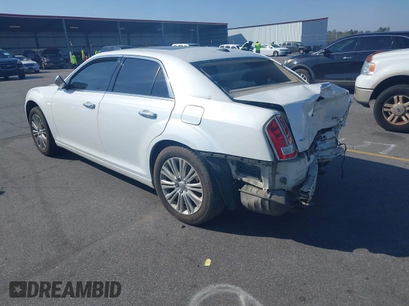 2013 Chrysler 300 Luxury Series with VIN 2C3CCASGXDH573689, listed as a IAAI auction lot 41782712 with 204,746 mi miles and . Bid and sale history available at DreamBid. Image 3.