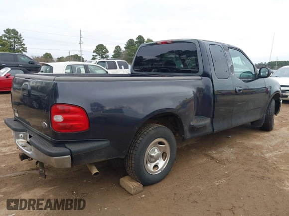 1999 Ford F-150 with VIN 1FTRX07W3XKC24438, listed as a IAAI auction lot 41634802 with Not provided miles and . Bid and sale history available at DreamBid. Image 4.