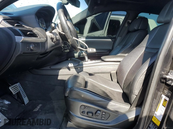 2014 BMW X6 M with VIN 5YMGZ0C50E0C40694, listed as a Copart auction lot 43943305 with 124,104 mi miles and Salvage Title. Bid and sale history available at carsss.com. Image 7.
