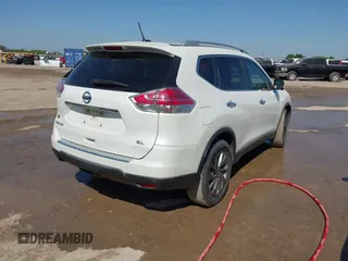 2016 Nissan Rogue SV with VIN KNMAT2MT1GP686630, listed as a IAAI auction lot 42000985 with 131,058 mi miles. Bid and sale history available at carsss.com. Image 4.