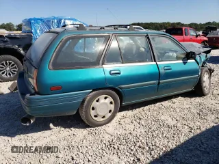 1995 Ford Escort z VIN 1FASP15J8SW308311, wystawiony jako Copart lot #77624004 z przebiegiem 345 777 mil mil oraz Szkoda całkowita • Salvage title. Historia ofert i sprzedaży dostępna na DreamBid. Obrazek 3.