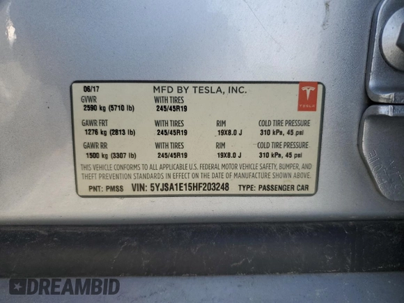 2017 Tesla Model S 60 with VIN 5YJSA1E15HF203248, listed as a Copart auction lot 54923855 with 84,214 mi miles and Salvage title. Bid and sale history available at DreamBid. Image 12.
