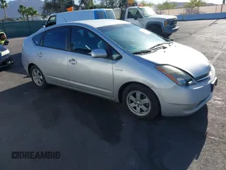 2006 Toyota Prius z VIN JTDKB20UX67506016, wystawiony jako IAAI lot #42262436 z przebiegiem 197 426 mil mil oraz . Historia ofert i sprzedaży dostępna na DreamBid. Obrazek 1.