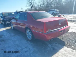 2006 Cadillac DTS w/1SC with VIN 1G6KD57Y06U210141, listed as a IAAI auction lot 41406256 with 184,569 mi miles. Bid and sale history available at carsss.com. Image 3.