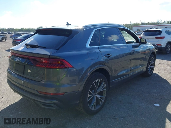 2021 Audi Q8 Premium Plus z VIN WA1EVAF15MD035056, wystawiony jako IAAI lot #41534412 z przebiegiem 65 579 mil mil oraz . Historia ofert i sprzedaży dostępna na DreamBid. Obrazek 4.