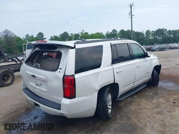 2019 Chevrolet Tahoe LT with VIN 1GNSKBKC3KR144850, listed as a IAAI auction lot 42420199 with Not provided miles and . Bid and sale history available at DreamBid. Image 4.