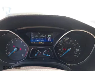 2017 Ford Focus SE with VIN 1FADP3F21HL263170, listed as a IAAI auction lot 41990977 with 104,794 mi miles. Bid and sale history available at carsss.com. Image 7.