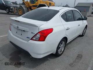 2015 Nissan Versa SV with VIN 3N1CN7AP7FL812770, listed as a IAAI auction lot 42047127 with 112,151 mi miles. Bid and sale history available at carsss.com. Image 4.