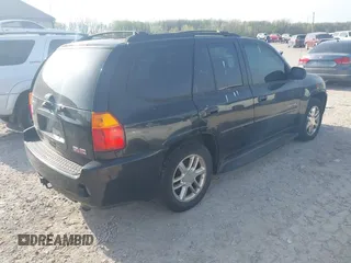 2008 GMC Envoy Denali with VIN 1GKET63M782214289, listed as a IAAI auction lot 42094430 with 250,000 mi miles. Bid and sale history available at carsss.com. Image 4.