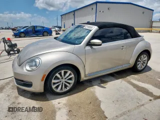2013 Volkswagen Beetle 2.0L TDI with VIN 3VW5L7AT5DM828253, listed as a Copart auction lot 62106885 with 77,140 mi miles and Clean title. Bid and sale history available at DreamBid. Image 1.