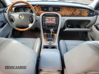 2005 Jaguar XJ with VIN SAJWA73B05TG40023, listed as a Copart auction lot 73163814 with 95,818 mi miles and Salvage Title. Bid and sale history available at carsss.com. Image 8.
