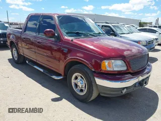 2003 Ford F-150 XLT with VIN 1FTRW07693KC11903, listed as a IAAI auction lot 41993455 with 301,023 mi miles. Bid and sale history available at carsss.com. Image 1.