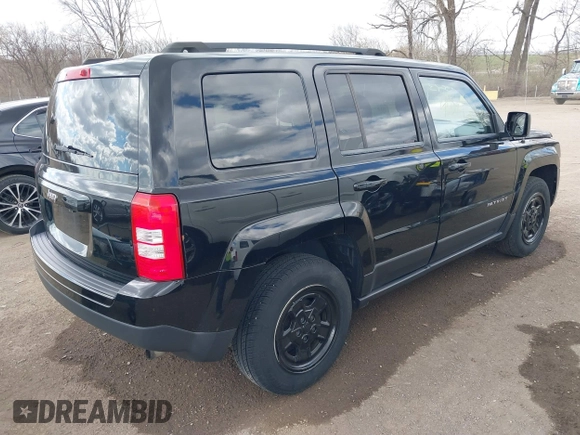 2014 Jeep Patriot Sport with VIN 1C4NJPBA4ED844253, listed as a IAAI auction lot 41879323 with 170,551 mi miles and . Bid and sale history available at carsss.com. Image 4.