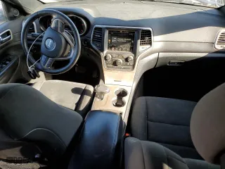 2015 Jeep Grand Cherokee Laredo with VIN 1C4RJFAG6FC893012, listed as a Copart auction lot 47705655 with 201,056 mi miles and Salvage Title. Bid and sale history available at carsss.com. Image 8.