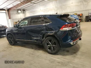 2021 Volkswagen Atlas SE with VIN 1V2NE2CA2MC201165, listed as a Copart auction lot 58757245 with 54,802 mi miles and Salvage title. Bid and sale history available at DreamBid. Image 2.