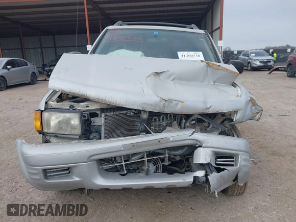 1999 Isuzu Rodeo S with VIN 4S2CK58W4X4358898, listed as a IAAI auction lot 41360738 with 184,948 mi miles and . Bid and sale history available at carsss.com. Image 12.