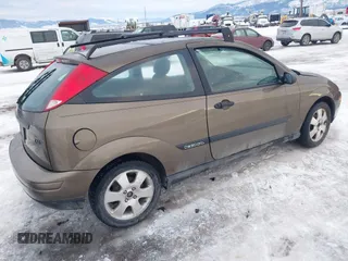 2000 Ford Focus ZX3 with VIN 3FAFP3137YR246156, listed as a IAAI auction lot 41330476 with 209,212 mi miles and . Bid and sale history available at DreamBid. Image 4.