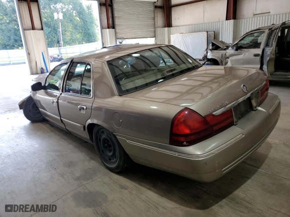 2003 Mercury Grand Marquis GS Convenience with VIN 2MEFM74W43X706057, listed as a Copart auction lot 65842884 with 215,829 mi miles and Salvage Title. Bid and sale history available at carsss.com. Image 2.