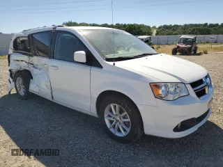2018 Dodge Grand Caravan SXT with VIN 2C4RDGCG4JR360103, listed as a Copart auction lot 53209605 with 153,827 mi miles and Salvage Title. Bid and sale history available at DreamBid. Image 4.