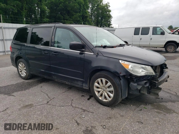 2014 Volkswagen Routan SE z VIN 2C4RVABG1ER134621, wystawiony jako Copart lot #61339414 z przebiegiem 153 364 mil mil oraz Szkoda całkowita • Salvage title. Historia ofert i sprzedaży dostępna na DreamBid. Obrazek 4.