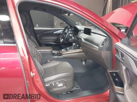 2023 Mazda CX-9 Signature with VIN JM3TCBEY4P0634153, listed as a IAAI auction lot 42132856 with 25,131 mi miles and . Bid and sale history available at DreamBid. Image 5.