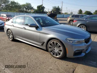 2017 BMW 5 Series 530i xDrive with VIN WBAJA7C38HG906137, listed as a Copart auction lot 66202255 with 154,480 mi miles and Clean title. Bid and sale history available at DreamBid. Image 4.