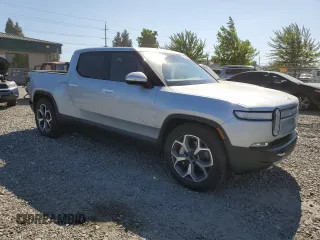 2023 Rivian R1T Adventure z VIN 7FCTGBAA0PN025046, wystawiony jako Copart lot #62502274 z przebiegiem 1385 mil mil oraz Szkody całkowita. Historia ofert i sprzedaży dostępna na DreamBid. Obrazek 4.