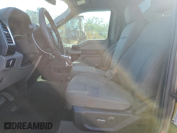 2016 Ford F-150 XL with VIN 1FTNF1EF4GKE41328, listed as a Copart auction lot 77177414 with 118,978 mi miles and Salvage title. Bid and sale history available at DreamBid. Image 7.