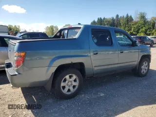 2006 Honda Ridgeline RTL with VIN 2HJYK16556H545357, listed as a Copart auction lot 70656694 with 153,668 mi miles and Salvage Title. Bid and sale history available at carsss.com. Image 3.