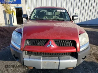 2006 Mitsubishi Raider Duro Cross z VIN 1Z7HT38N66S538442, wystawiony jako Copart lot #77142384 z przebiegiem 164 741 mil mil oraz Czysty tytuł • Clean title. Historia ofert i sprzedaży dostępna na DreamBid. Obrazek 5.