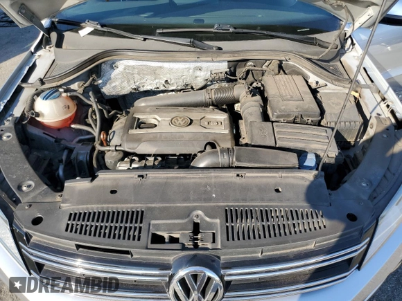 2013 Volkswagen Tiguan S with VIN WVGAV7AX8DW501081, listed as a Copart auction lot 88065365 with 157,312 mi miles and Salvage title. Bid and sale history available at DreamBid. Image 11.