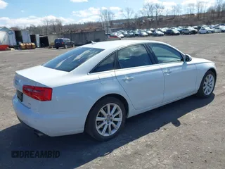 2015 Audi A6 2.0T Premium Plus with VIN WAUGFAFC7FN025958, listed as a IAAI auction lot 41888489 with 100,600 mi miles. Bid and sale history available at carsss.com. Image 4.