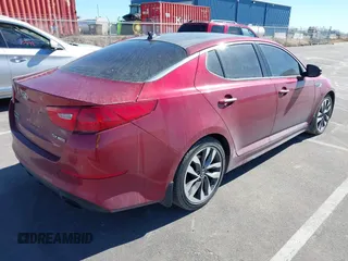 2015 Kia Optima SX Turbo with VIN 5XXGR4A64FG396164, listed as a IAAI auction lot 41682721 with 143,420 mi miles. Bid and sale history available at carsss.com. Image 4.
