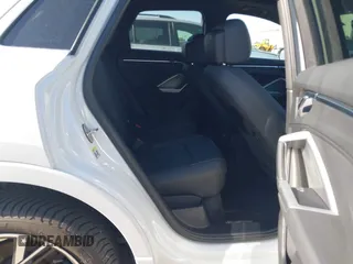 2019 Audi Q3 Premium z VIN WA1AECF32K1072625, wystawiony jako IAAI lot #42326866 z przebiegiem 67 351 mil mil oraz . Historia ofert i sprzedaży dostępna na DreamBid. Obrazek 8.