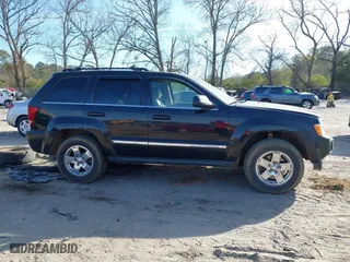 2005 Jeep Grand Cherokee Limited with VIN 1J4HR58245C697913, listed as a IAAI auction lot 41893223 with 255,297 mi miles. Bid and sale history available at carsss.com. Image 14.