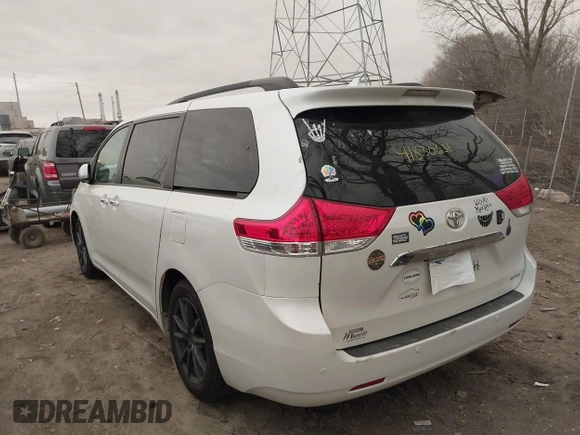 2011 Toyota Sienna XLE AAS with VIN 5TDYK3DC8BS003313, listed as a IAAI auction lot 41830631 with 214,514 mi miles and . Bid and sale history available at DreamBid. Image 3.